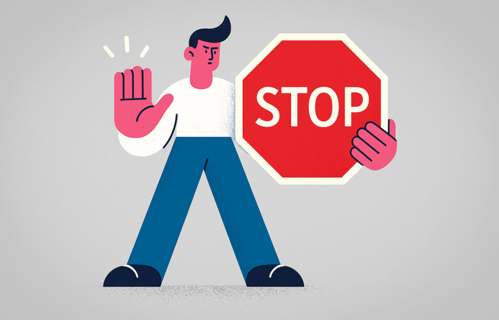 Mies pitelee "STOP" kylttiä.