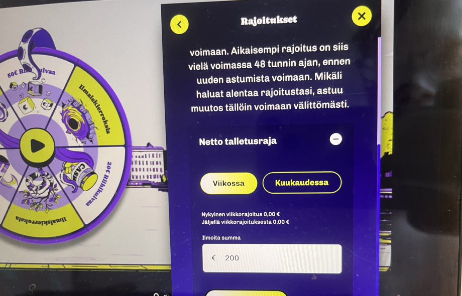 Kuvassa pelaaja on asettamassa tappiorajaa Lonkero Casinolla.