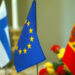 Suomen, EU:n ja Espanjan liput pöydällä.