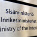 Sisäministeriö ovikyltti.